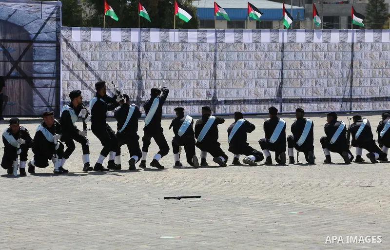 Palestinian members of officers display their skills during a graduation ceremony, in Gaza city, on March 6, 2016. Photo by Mohammed Asad