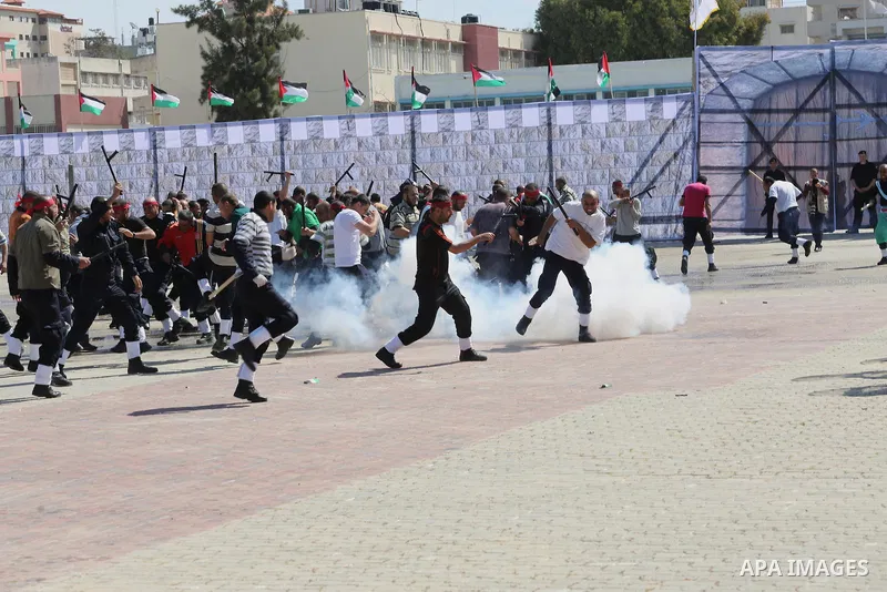 Palestinian members of officers display their skills during a graduation ceremony, in Gaza city, on March 6, 2016. Photo by Mohammed Asad