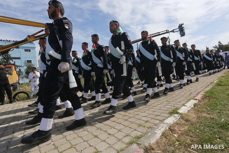 Palestinian members of officers display their skills during a graduation ceremony, in Gaza city, on March 6, 2016. Photo by Mohammed Asad