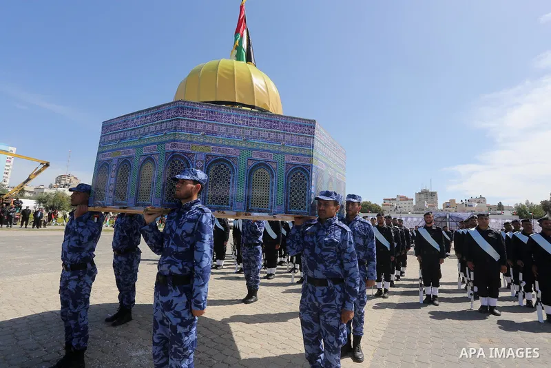 Palestinian members of officers display their skills during a graduation ceremony, in Gaza city, on March 6, 2016. Photo by Mohammed Asad