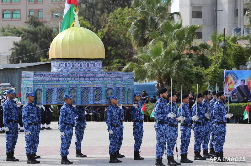 Palestinian members of officers display their skills during a graduation ceremony, in Gaza city, on March 6, 2016. Photo by Mohammed Asad