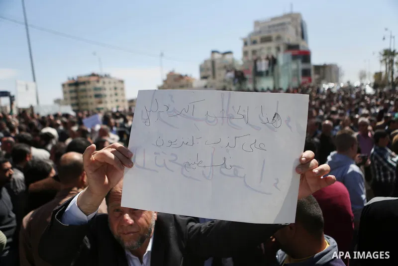 Palestinian teachers take part in a protest to demand their rights in front of the headquarters of the Council of Ministers, in the West bank city of Ramallah, March7, 2016. Photo by Shadi Hatem