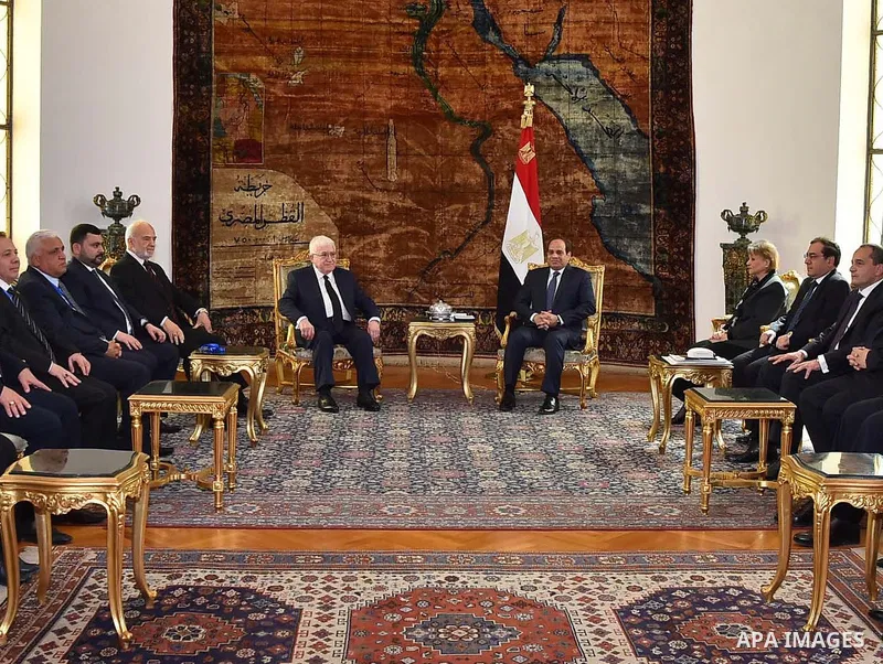 A handout picture released by the Egyptian Presidency on March 7, 2016 shows Egyptian President Abdel Fattah al-Sisi meeting with his Iraqi counterpart Fuad Masum in Cairo. Photo by Egyptian President Office