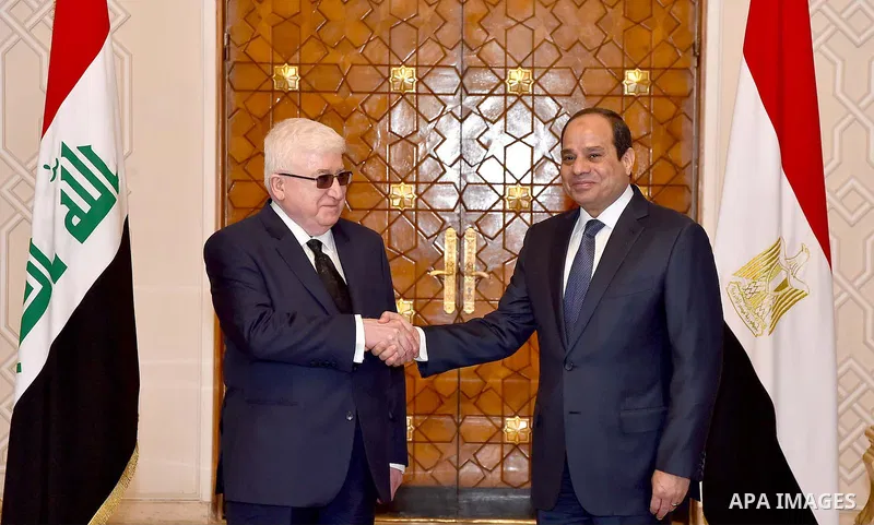 A handout picture released by the Egyptian Presidency on March 7, 2016 shows Egyptian President Abdel Fattah al-Sisi meeting with his Iraqi counterpart Fuad Masum in Cairo. Photo by Egyptian President Office