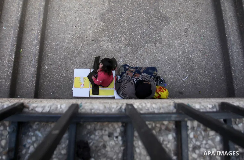 A Palestinian woman begging in the streets, in the West Bank city of Nablus, on March 8, 2016. People around the globe celebrate International Women's Day, which dates back to the beginning of the 20th Century and has be...