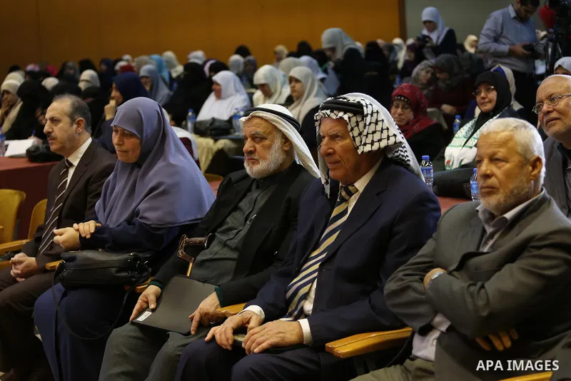 Palestinians attend a meeting on the occasion of International Women's Day in Gaza City on March 8, 2016. People around the globe celebrate International Women's Day, which dates back to the beginning of the 20th Century...