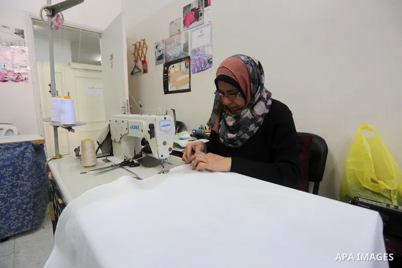 Palestinian women work on embroidery on the occasion of International Women's Day in Gaza City on March 8, 2016. People around the globe celebrate International Women's Day, which dates back to the beginning of the 20th...