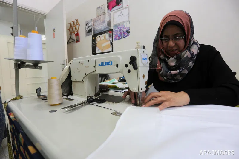 Palestinian women work on embroidery on the occasion of International Women's Day in Gaza City on March 8, 2016. People around the globe celebrate International Women's Day, which dates back to the beginning of the 20th...
