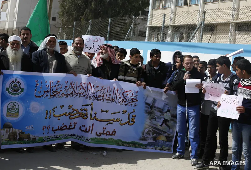 Palestinians take part during a protest to show solidarity with Al-Aqsa mosque and Palestinians in the West Bank occupied, in khan Younis in the southern Gaza strip on March 9, 2016. Photo by Ramadan El-agha