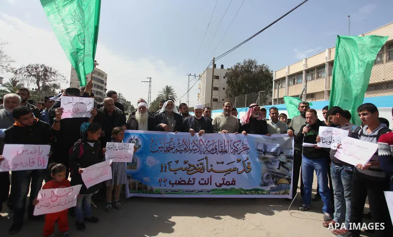 Palestinians take part during a protest to show solidarity with Al-Aqsa mosque and Palestinians in the West Bank occupied, in khan Younis in the southern Gaza strip on March 9, 2016. Photo by Ramadan El-agha