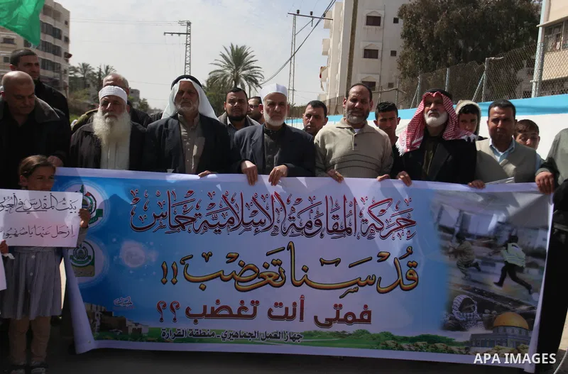 Palestinians take part during a protest to show solidarity with Al-Aqsa mosque and Palestinians in the West Bank occupied, in khan Younis in the southern Gaza strip on March 9, 2016. Photo by Ramadan El-agha