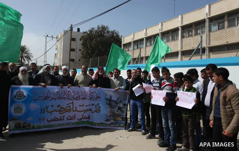 Palestinians take part during a protest to show solidarity with Al-Aqsa mosque and Palestinians in the West Bank occupied, in khan Younis in the southern Gaza strip on March 9, 2016. Photo by Ramadan El-agha