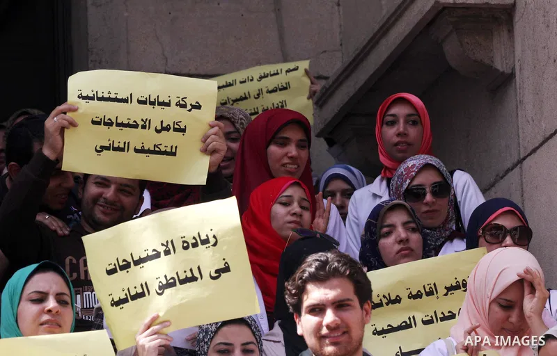 Egyptian Doctors take part in a protest to demanding their rights, in Cairo, Egypt, on March 9, 2016. Photo by Amr Sayed