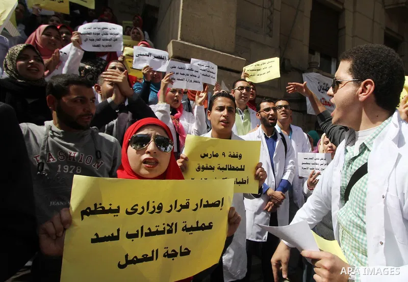 Egyptian Doctors take part in a protest to demanding their rights, in Cairo, Egypt, on March 9, 2016. Photo by Amr Sayed