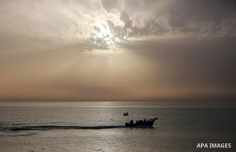 Palestininas ride a boat in the Mediterranean sea on the coast of Gaza city, on March 09, 2016. Photo by Yasser Qudih