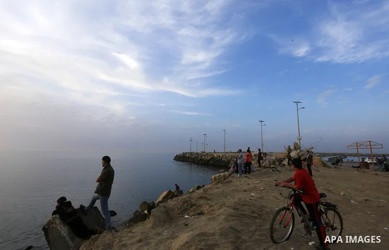 Palestinians enjoy a day at the beach of the Mediterranean sea on the coast of Gaza city, on March 09, 2016. Photo by Yasser Qudih