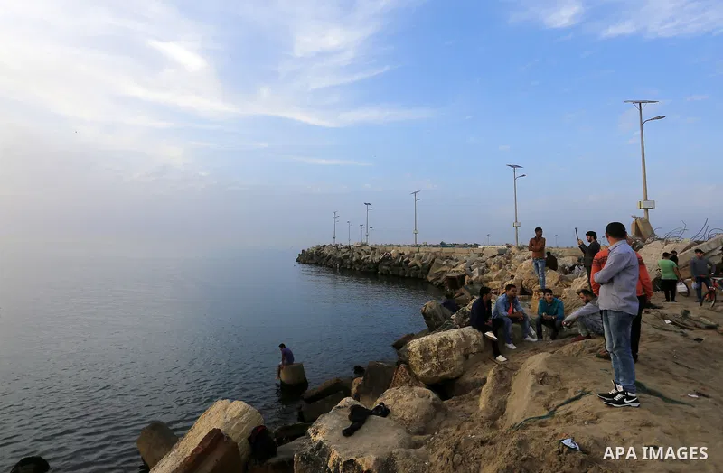 Palestinians enjoy a day at the beach of the Mediterranean sea on the coast of Gaza city, on March 09, 2016. Photo by Yasser Qudih