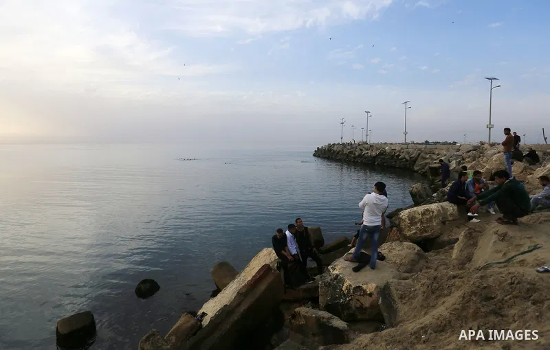 Palestinians enjoy a day at the beach of the Mediterranean sea on the coast of Gaza city, on March 09, 2016. Photo by Yasser Qudih