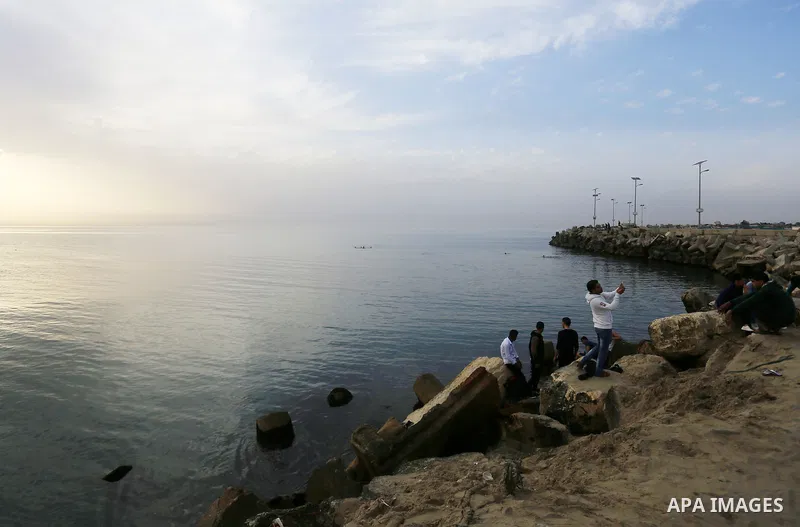 Palestinians enjoy a day at the beach of the Mediterranean sea on the coast of Gaza city, on March 09, 2016. Photo by Yasser Qudih