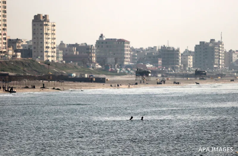 Palestininas swim in the Mediterranean sea on the coast of Gaza city, on March 09, 2016. Photo by Yasser Qudih