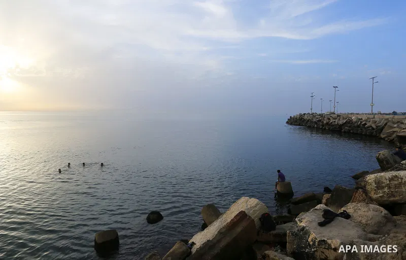 Palestinians enjoy a day at the beach of the Mediterranean sea on the coast of Gaza city, on March 09, 2016. Photo by Yasser Qudih
