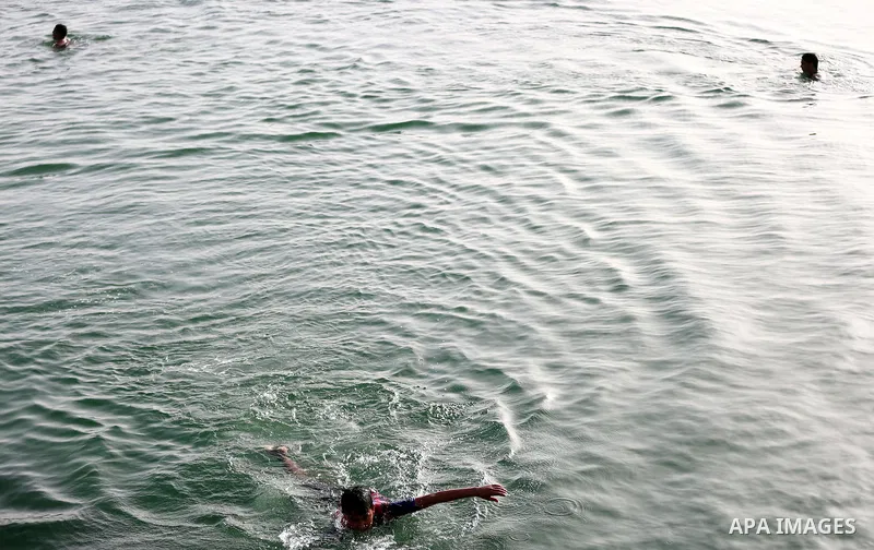 Palestininas swim in the Mediterranean sea on the coast of Gaza city, on March 09, 2016. Photo by Yasser Qudih