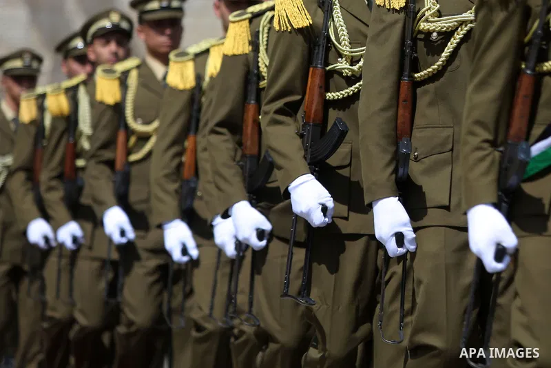 Palestinian honor guards during a welcome ceremony for Romanian President Klaus Iohannis at the Muqata, the Palestinian Presidential Headquarters upon his arrival to the West Bank city of Ramallah on March 10, 2016. Phot...