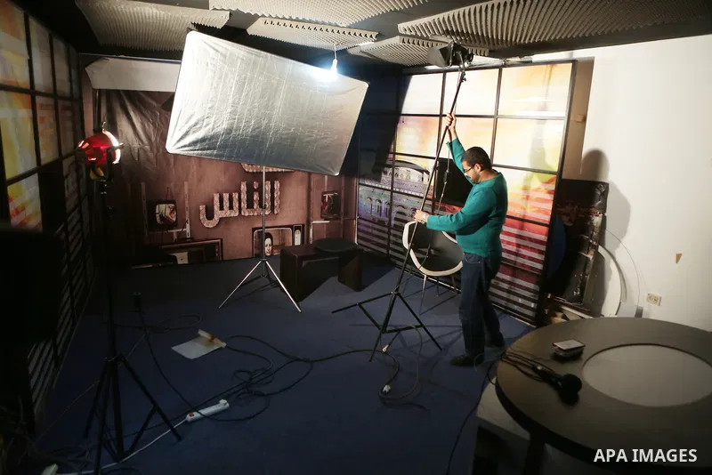 Palestinian employees of Palestine Today television inspect the damage at the station's offices after it had been raided by Israeli forces overnight on March 11, 2016, in the West Bank city of Ramallah. Israeli forces ra...