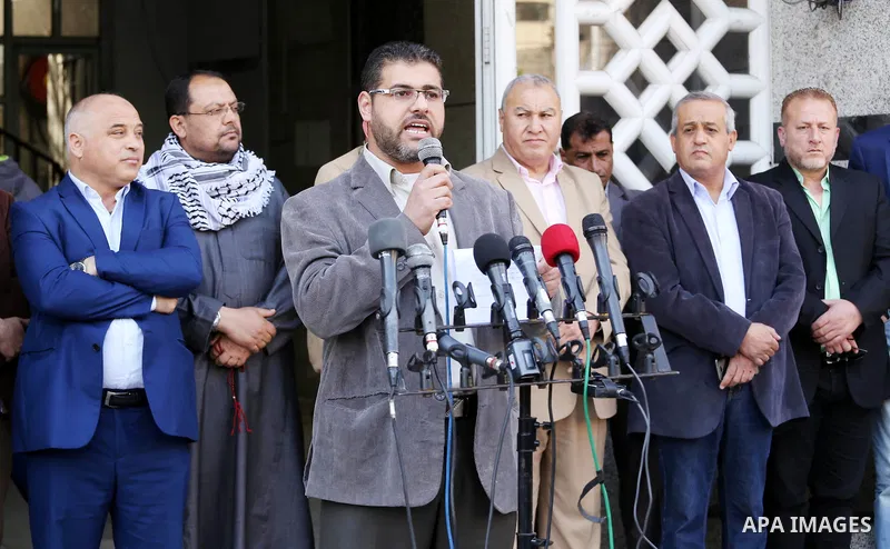 Palestinian Journalists take part during a protest to show solidarity with Palestine Today television after it had been raided by Israeli forces overnight on March 11, 2016 in Gaza city. Israeli forces raided the TV's of...