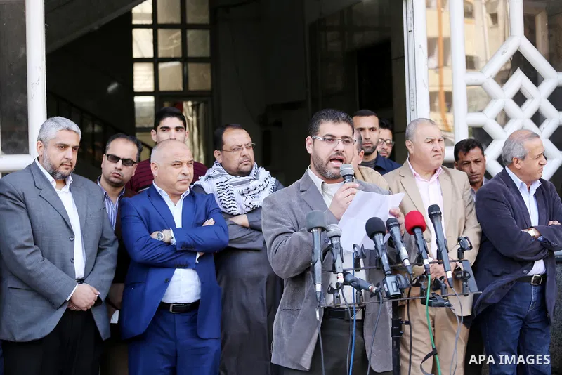 Palestinian Journalists take part during a protest to show solidarity with Palestine Today television after it had been raided by Israeli forces overnight on March 11, 2016 in Gaza city. Israeli forces raided the TV's of...