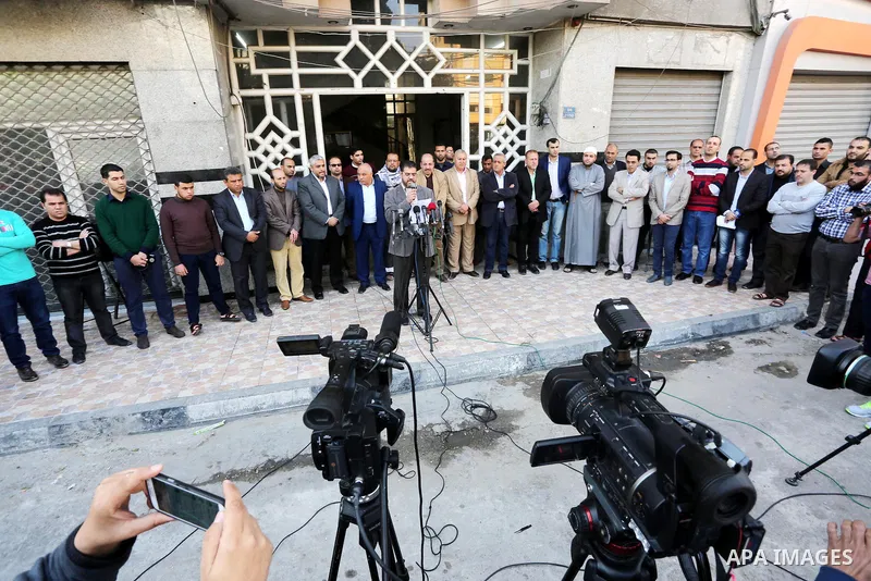 Palestinian Journalists take part during a protest to show solidarity with Palestine Today television after it had been raided by Israeli forces overnight on March 11, 2016 in Gaza city. Israeli forces raided the TV's of...