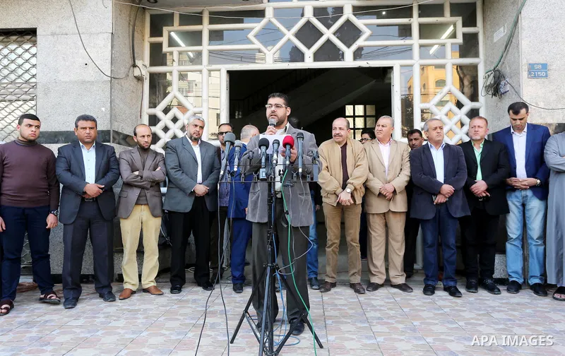 Palestinian Journalists take part during a protest to show solidarity with Palestine Today television after it had been raided by Israeli forces overnight on March 11, 2016 in Gaza city. Israeli forces raided the TV's of...
