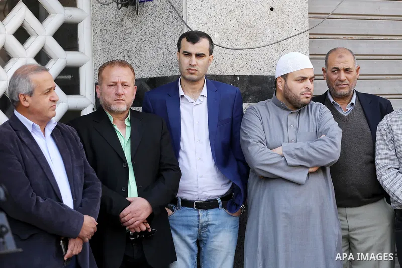 Palestinian Journalists take part during a protest to show solidarity with Palestine Today television after it had been raided by Israeli forces overnight on March 11, 2016 in Gaza city. Israeli forces raided the TV's of...