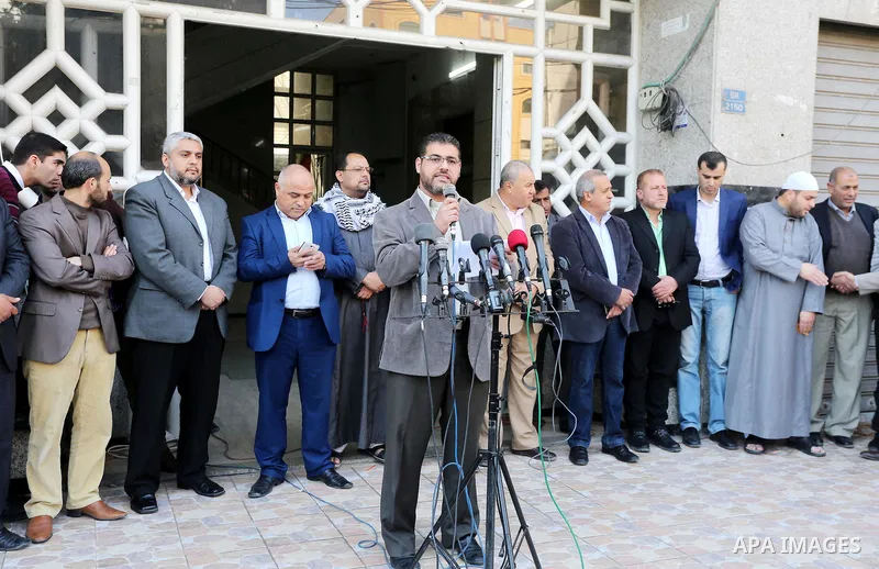 Palestinian Journalists take part during a protest to show solidarity with Palestine Today television after it had been raided by Israeli forces overnight on March 11, 2016 in Gaza city. Israeli forces raided the TV's of...
