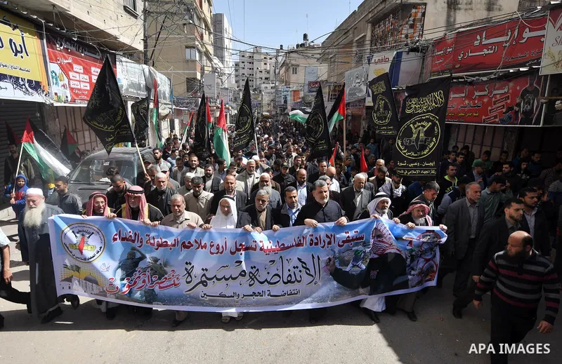 Palestinian supporters of the Islamic Jihad Movement take part in a demonstration in support of the second "intifada", or uprising, in 2000 on March 11, 2016 following the Friday prayers in Khan Yunis in the southern Gaz...