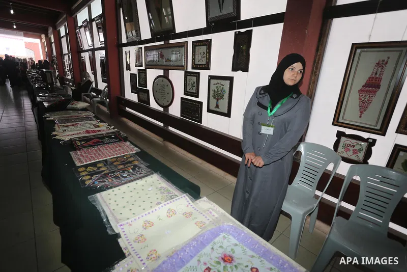 Palestinian Female Prisoners take part in an exhibition of art works and handicrafts products organized by the Ministry of Interior, in Gaza city on March 12, 2016. Photo by Mohammed Asad