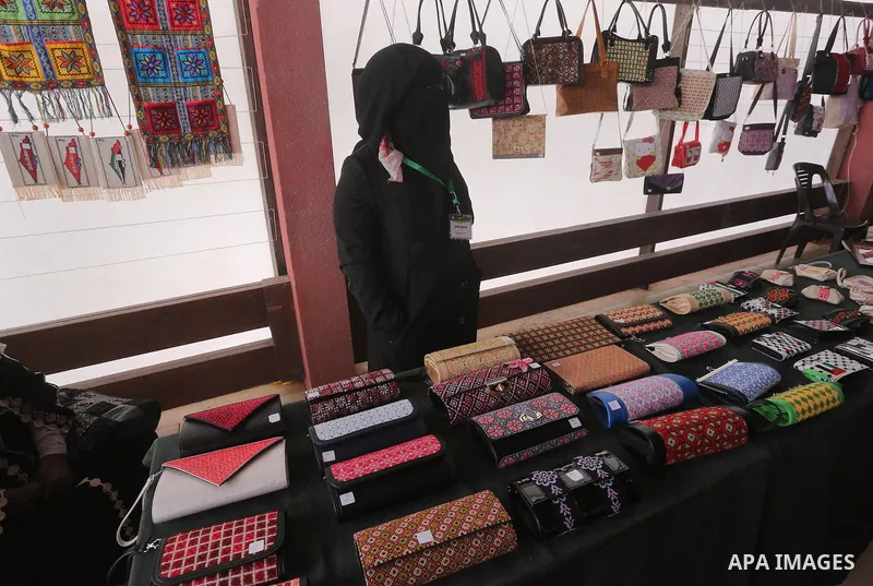 Palestinian Female Prisoners take part in an exhibition of art works and handicrafts products organized by the Ministry of Interior, in Gaza city on March 12, 2016. Photo by Mohammed Asad