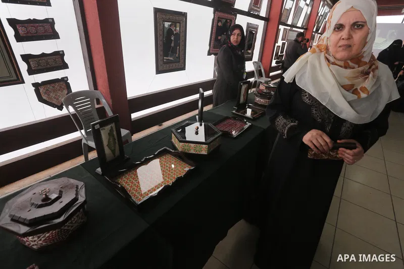 Palestinian Female Prisoners take part in an exhibition of art works and handicrafts products organized by the Ministry of Interior, in Gaza city on March 12, 2016. Photo by Mohammed Asad