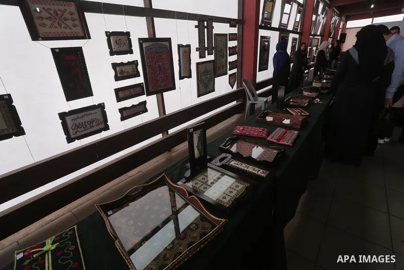 Palestinian Female Prisoners take part in an exhibition of art works and handicrafts products organized by the Ministry of Interior, in Gaza city on March 12, 2016. Photo by Mohammed Asad