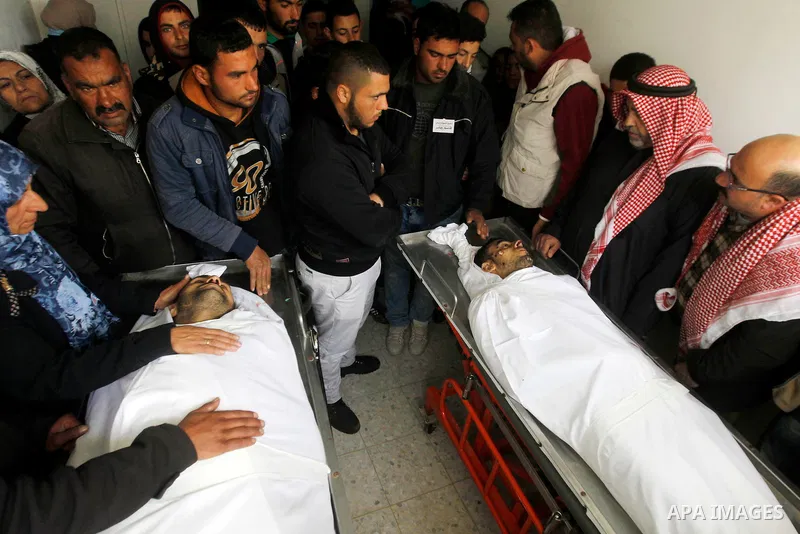 The mother of Qassem Jaber, a Palestinian who was shot dead following reported attacks on Israelis, mourns during his funeral on March 15, 2016 in the West Bank town of Hebron. Three Palestinians, Qassem Jaber, 30, and A...
