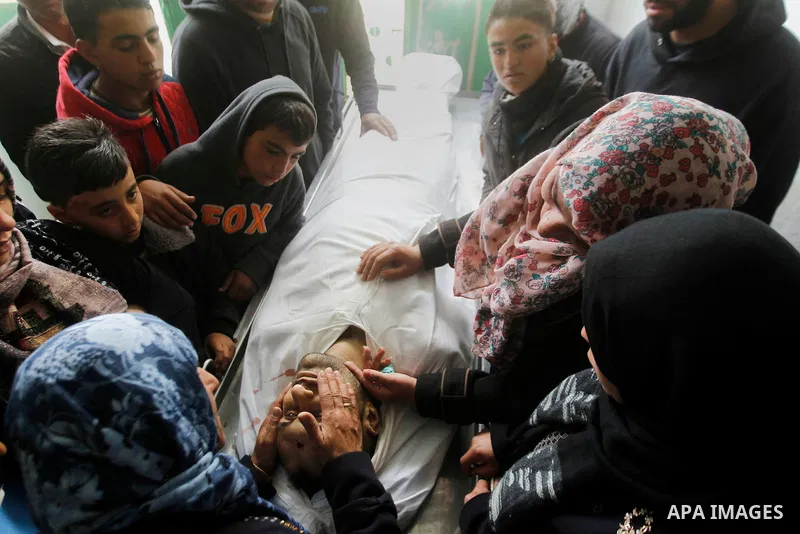 The sister of Qassem Jaber, a Palestinian who was shot dead following reported attacks on Israelis, mourns during his funeral on March 15, 2016 in the West Bank town of Hebron. Three Palestinians, Qassem Jaber, 30, and A...