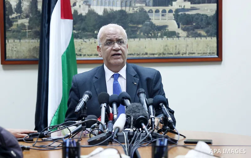 Palestinian negotiator Saeb Erakat speaks during a press conference after a meeting with France's special envoy for its initiative to renew Israeli-Palestinian peace talks, Pierre Vimont during a meeting to present Paris...