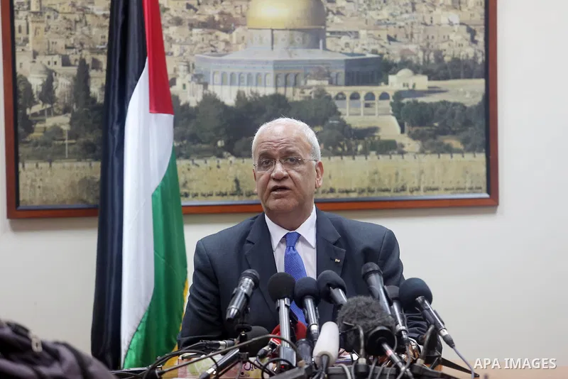 Palestinian negotiator Saeb Erakat speaks during a press conference after a meeting with France's special envoy for its initiative to renew Israeli-Palestinian peace talks, Pierre Vimont during a meeting to present Paris...
