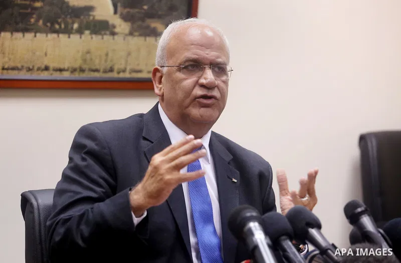 Palestinian negotiator Saeb Erakat speaks during a press conference after a meeting with France's special envoy for its initiative to renew Israeli-Palestinian peace talks, Pierre Vimont during a meeting to present Paris...