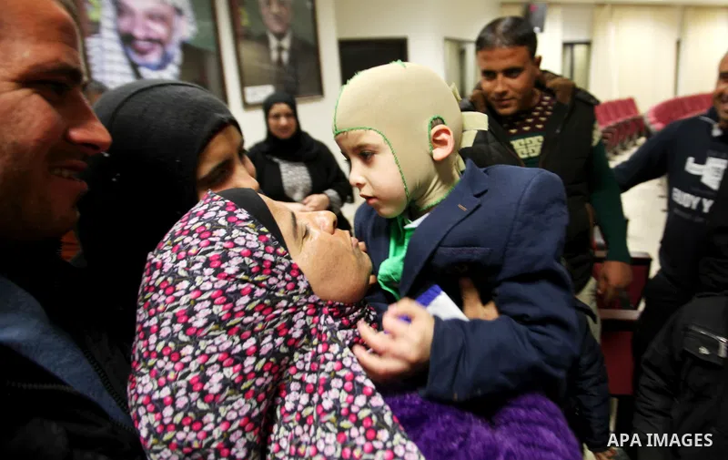 Five-year-old Ahmed Dawabsha, a Palestinian boy who survived a firebombing by Jewish extremists targeting his family home that killed his parents and brother, is seen before his meeting with the governor of the northern...