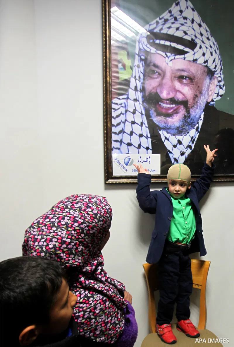 Five-year-old Ahmed Dawabsha, a Palestinian boy who survived a firebombing by Jewish extremists targeting his family home that killed his parents and brother, is seen before his meeting with the governor of the northern...