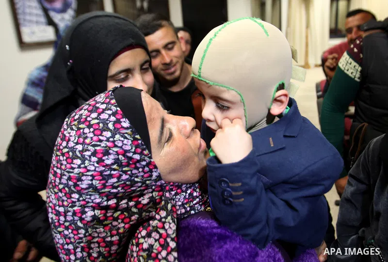 Five-year-old Ahmed Dawabsha, a Palestinian boy who survived a firebombing by Jewish extremists targeting his family home that killed his parents and brother, is seen before his meeting with the governor of the northern...
