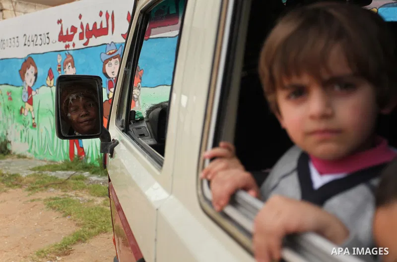 Salwa Sorour drives her mini-van in Gaza City on March 16, 2016. 40-year-old Salwa Sorour is the only woman who drives a kindergarten mini-van to transport children in the Gaza Strip. The Palestinian Central Bureau of St...