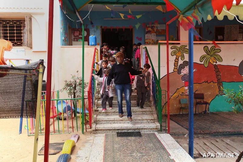 Salwa Sorour plays with children inside a kindergarten in Gaza City, on March 16, 2016. 40-year-old Salwa Sorour is the only woman who drives a kindergarten mini-van to transport children in the Gaza Strip. The Palestini...