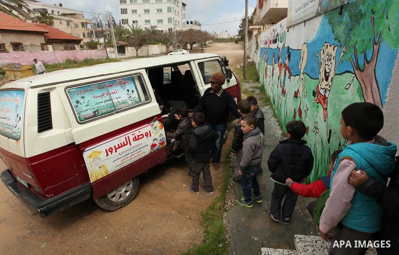Salwa Sorour drives her mini-van in Gaza City on March 16, 2016. 40-year-old Salwa Sorour is the only woman who drives a kindergarten mini-van to transport children in the Gaza Strip. The Palestinian Central Bureau of St...